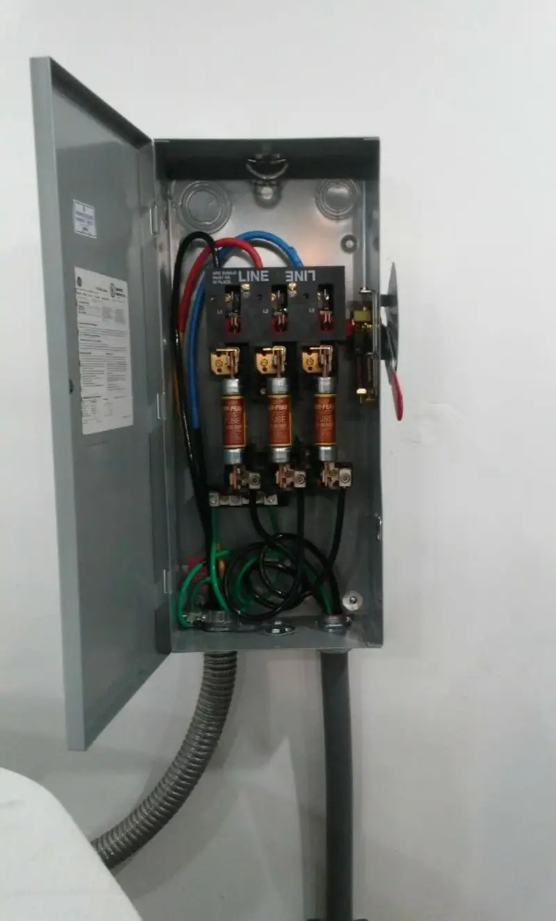 Three-phase disconnect switch installed for Smoke Detector Installation in Brightwaters